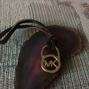 Authentic Michael Kors purse/luggage tag charm